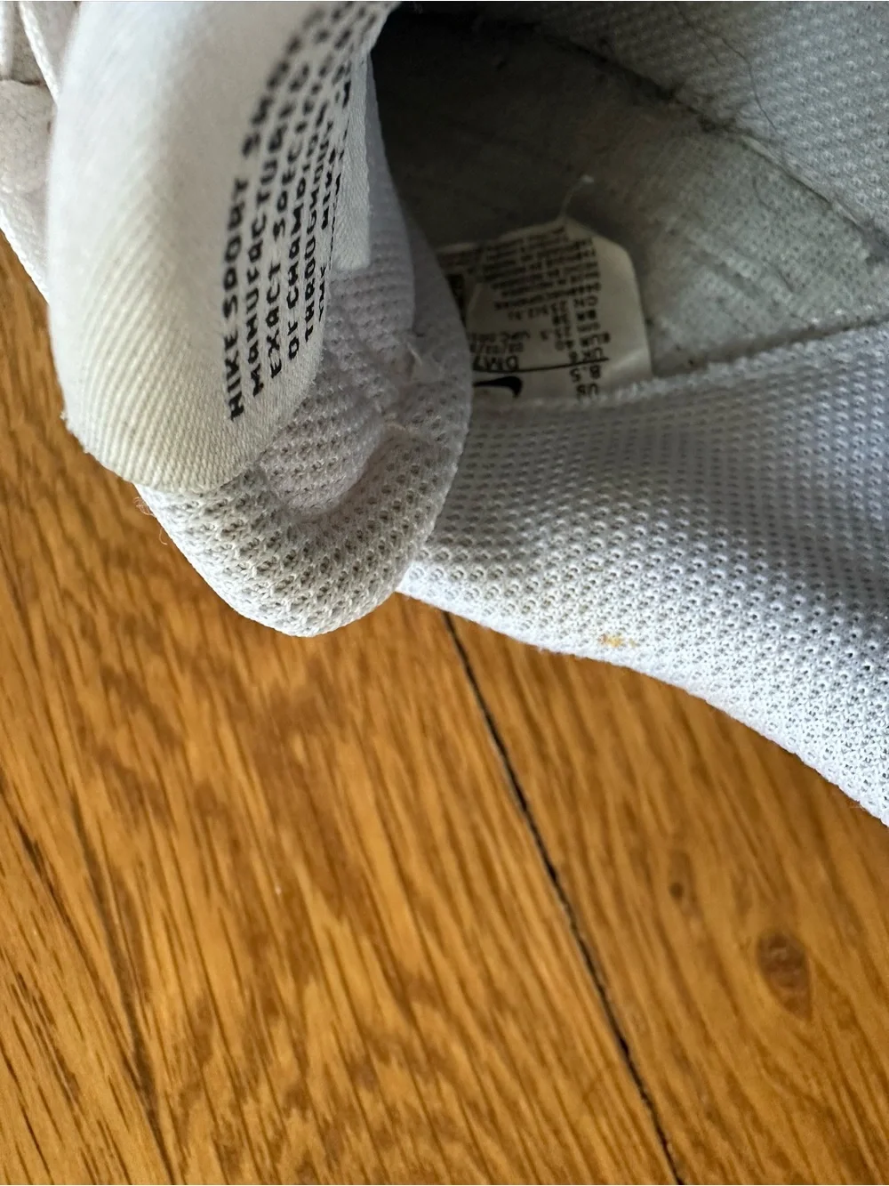 Nike Men’s White Sneakers with Black Swoosh